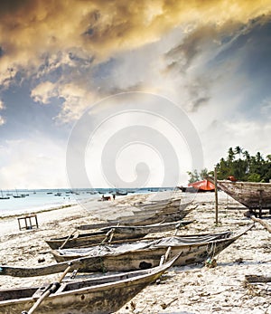 Many old fishing boats on african seashore