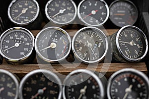 Many old motorcycle speedometers