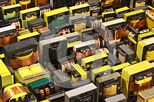 Many old used electrical ferrite power transformers