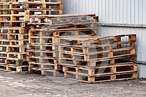 many old wooden pallets on the street