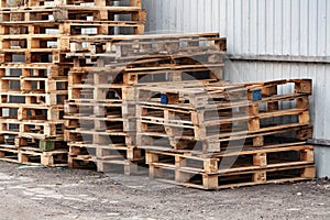 many old wooden pallets on the street