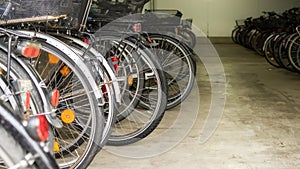 Many parked bicycles in a garage