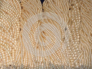 many Pearl necklace , soft focus, photo