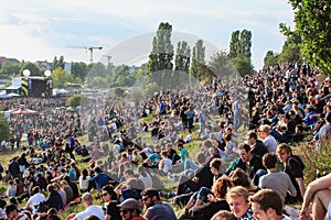 Many people in crowded park (Mauerpark) at fete de la musique