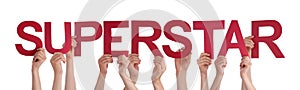 Many People Hands Holding Red Straight Word Superstar photo
