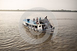Many people on a small boat