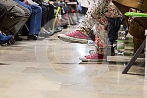 Many people in a waiting room photo