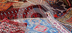 Many persian and oriental rugs