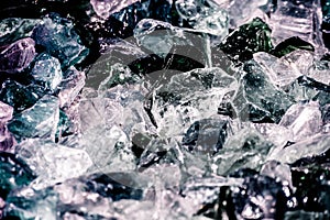 Many pieces of broken glass with cracks and splits