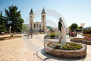 Many pilgrims visit the village church and the nearby Apparition Hill in Medjugorje, Bosnia and Herzegovina