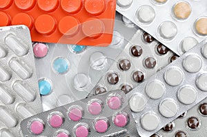 Many Pills and Tablets on table