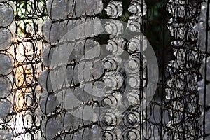 Many plastic bottle on grid