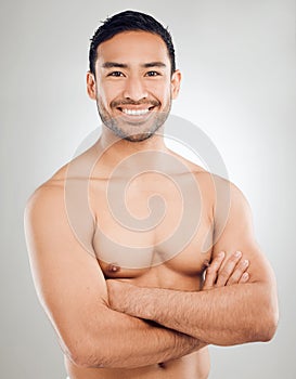 So many players, youd think lifes a game. Studio shot of a handsome young man posing against a grey background.