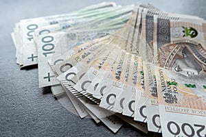 Many polish banknotes 100, 200 as financial background