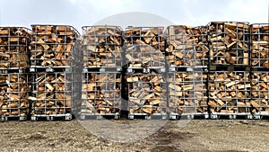 Many Prepared container firewood storage outside package store