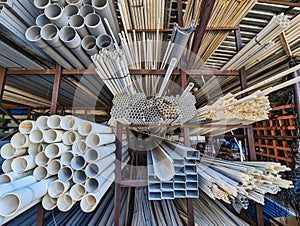 Many PVA Pipes Stacked in Building Supply Warehouse