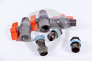 Many PVC plastic solenoid drain valve for connecting the supply water isolated on white background