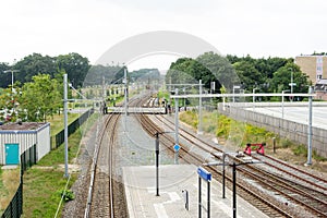 Many railway tracks and platform photo
