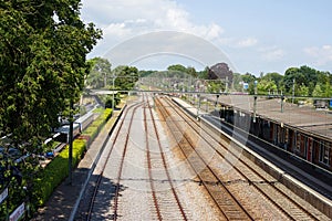 Many railway tracks at a station photo