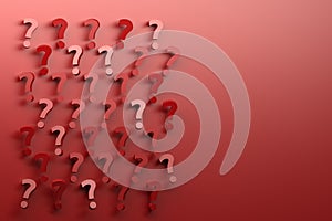 Many randomly arranged red question marks on red background.