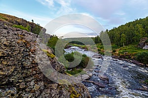 Many rapids with waterfalls, spray foam and whirlpools close-up, rotate camera. Ural region, Russia. The threshold Revun