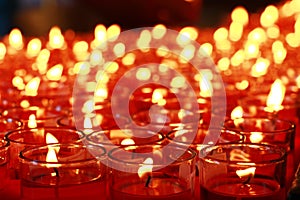 Many red candles burning