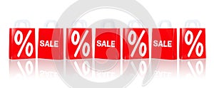 Many red shopping bags with sale and percentage