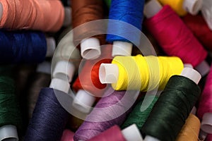 Many reels of threads for embroidery.