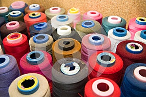 Many reels of threads standing on the table