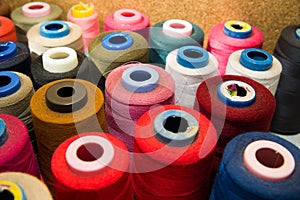 Many reels of threads standing on the table