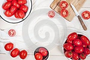 Many ripe red tomatoes on the wooden table