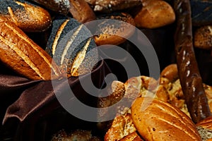 Many rolls of different breads in the bakery restaurant