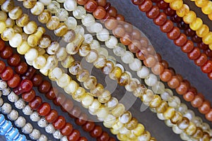 Many rosaries in various colors