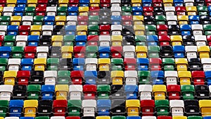 Many rows of bright colorful plastic seats, grandstand stadium