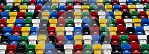 Many rows of bright colorful plastic seats, grandstand stadium