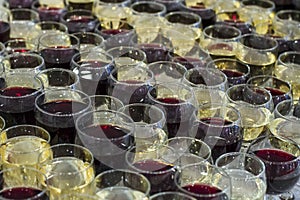 Many rows of glasses of wine and champagne