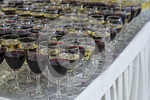 Many rows of glasses of wine and champagne
