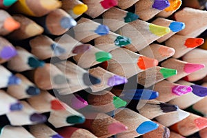 Many rows of sharpened colored pencils.