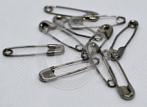 many safety pins together