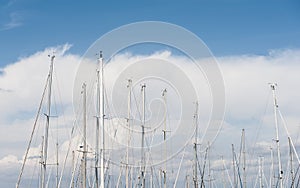 Many sailing boat mast on blue sky