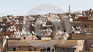 Many satellite dishes on buildings, Morocco