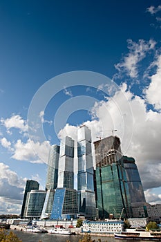 Many scyscrapers of Moscow city under blue sky