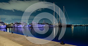 Many ships at night on the pier in the Aegean Sea Athens Greece