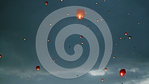 Many sky lanterns in the sky. Floating lanterns ceremony or Yeepeng ceremony, traditional Lanna Buddhist ceremony in