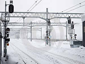 Many snowy railroad tracks