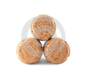 Many sparkling wine corks on white background