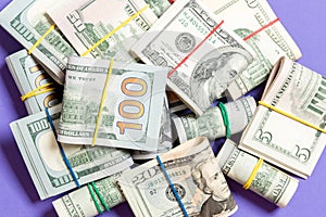 Many Stack of 100 dollar bills. Isolated on colored background top wiev with copy space