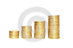 Many stacks of golden coins isolated on white for design financial concept