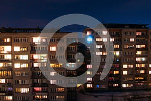 Many-storied buildings at night photo