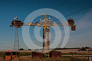 Many stork`s nests on a crane